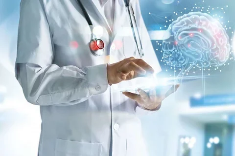 A physician using a futuristic tablet projecting an image of the human brain