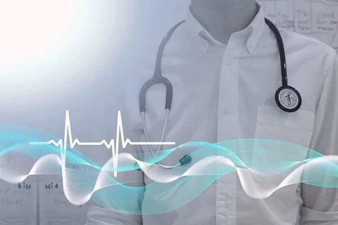 Doctor with stethoscope and an EKG reading in the foreground